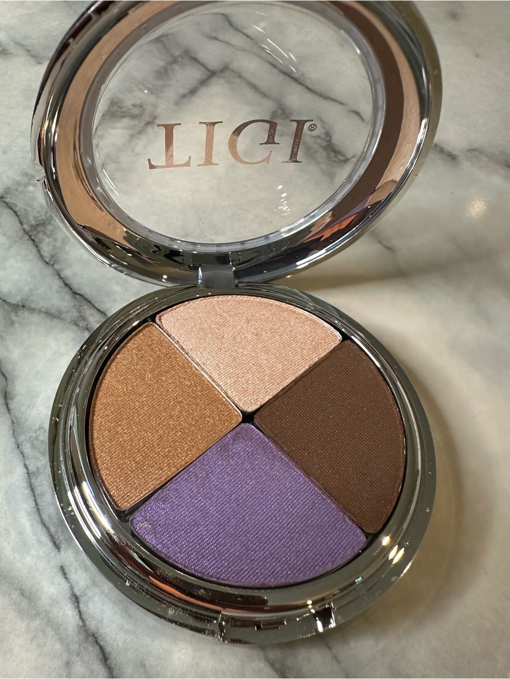 TIGI Four-Shade Eyeshadow Compact in Champagne, Bronze, Brown & Purple